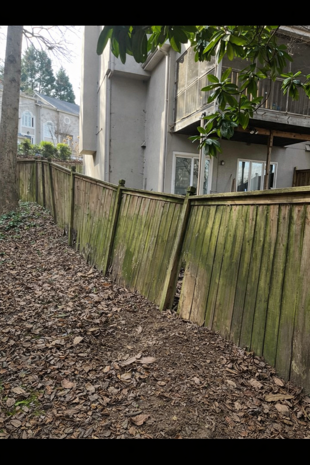 Damaged fence before repair